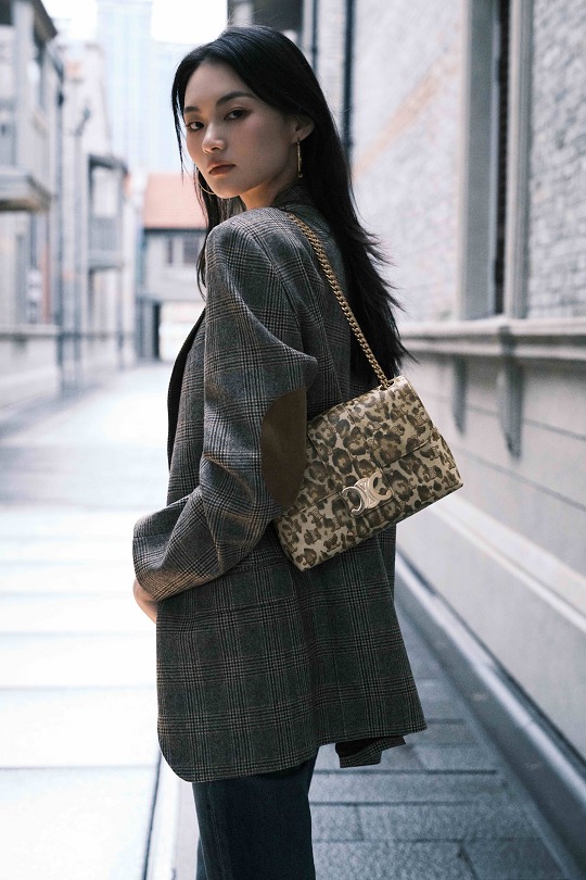 He Cong with Victoire Bag
