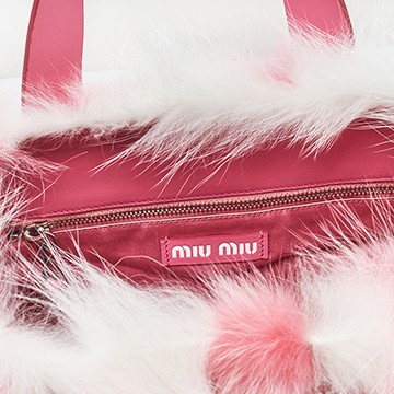 Miu Miu bag worn as shoulder bag