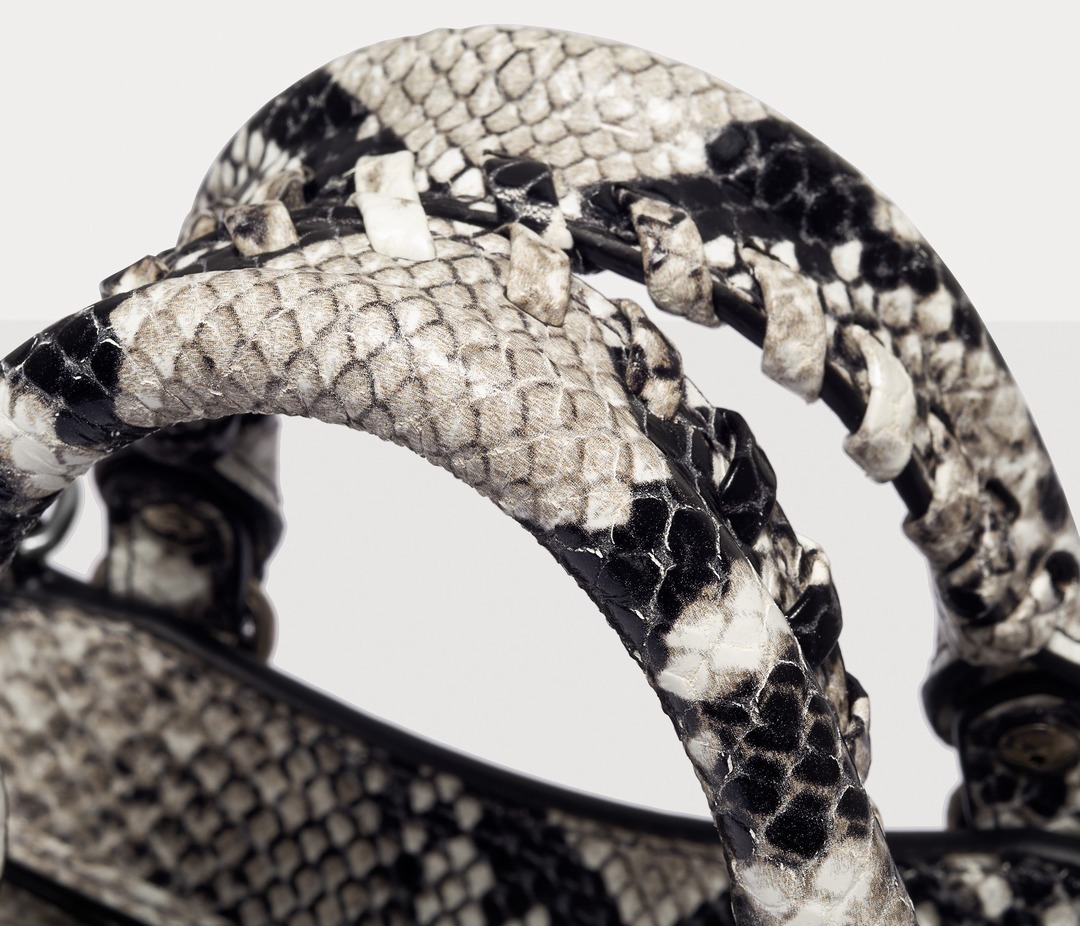 Close-up of woven handles